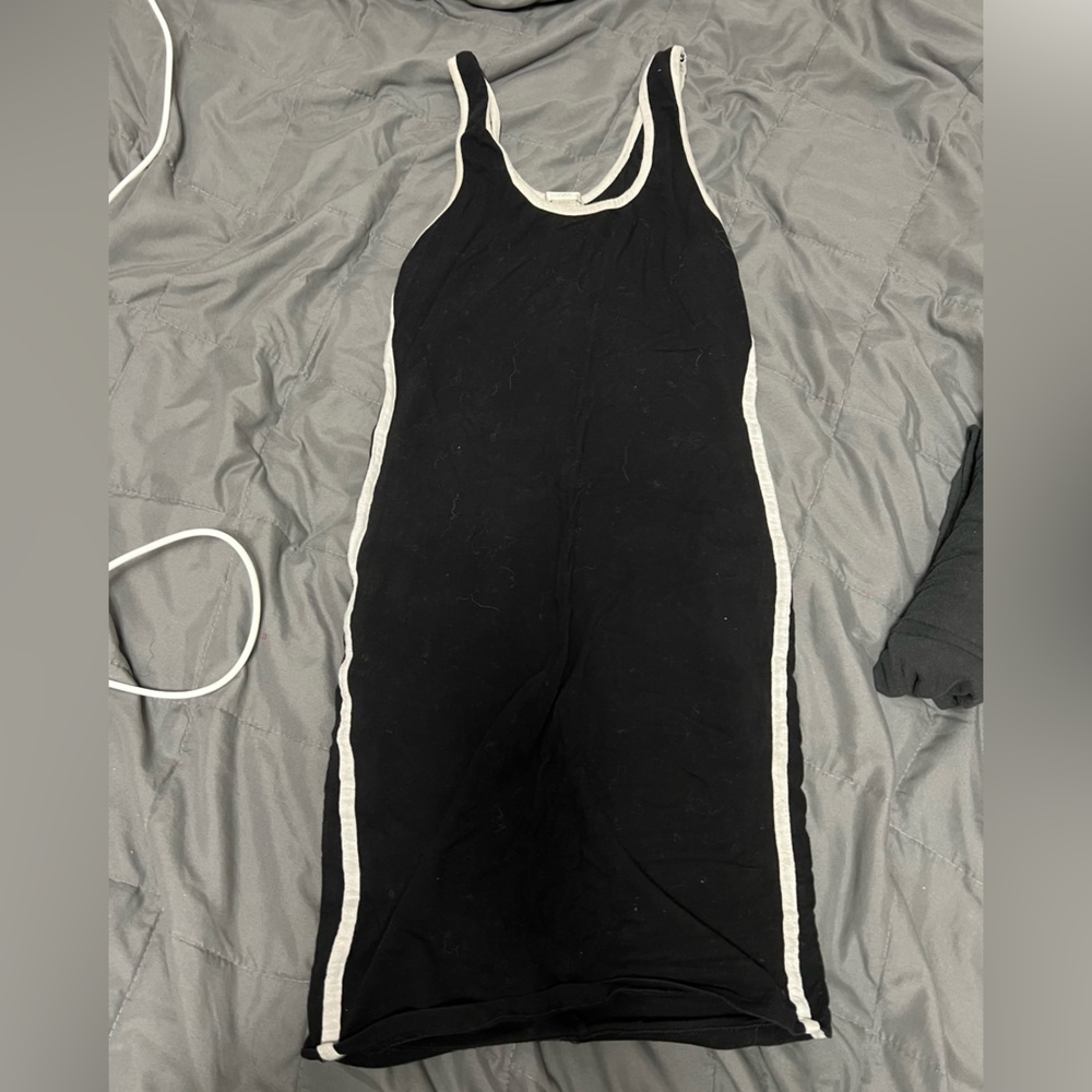 Black body con mini dress with white stripes on the side